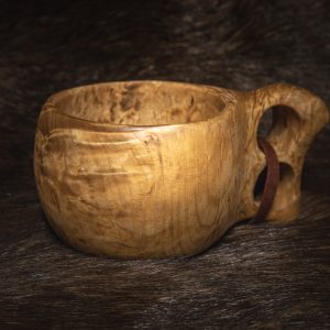 This is a handmade traditional Finnish cup made of wood, or kuksa.